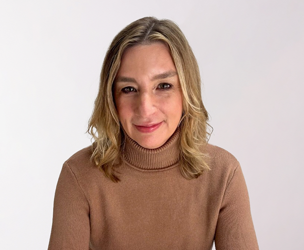 Headshot of Lori Jiménez, Chief Revenue Officer, wearing a tan top.